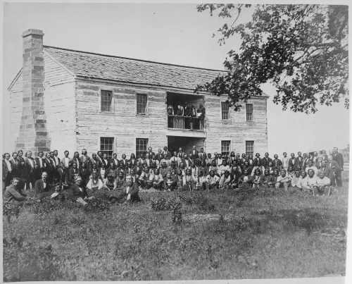 Delegates from 34 tribes in front of Creek Council House, Indian Territory (Oklahoma), ca. 1880 #53