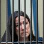 Token AOC BEHIND BARS